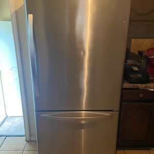 Stainless steel Kenmore refrigerator and freezer